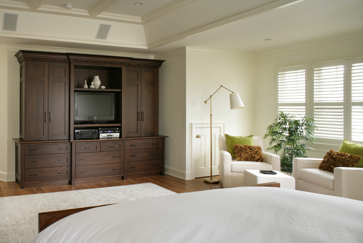 Traditional Warmth Meets Modern Functionality in this Home Office and Primary Suite